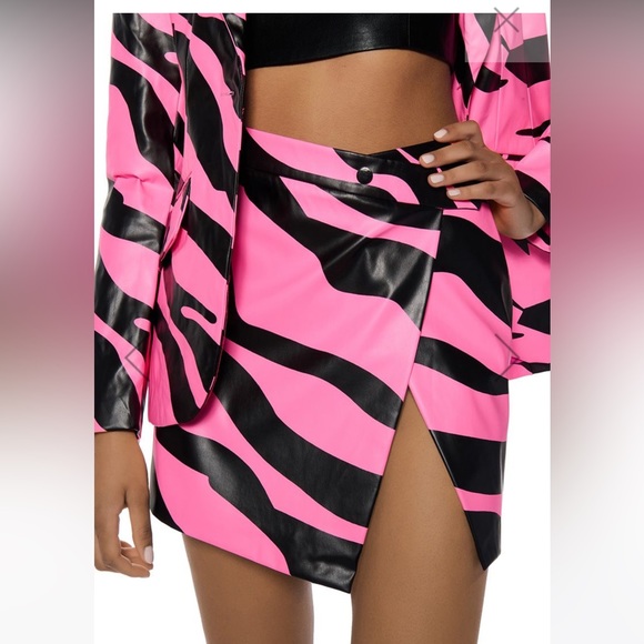AKIRA Dresses & Skirts - CANT BE TAMED FAUX LEATHER MINI SKIRT IN PINK by Akira size M. Like new.